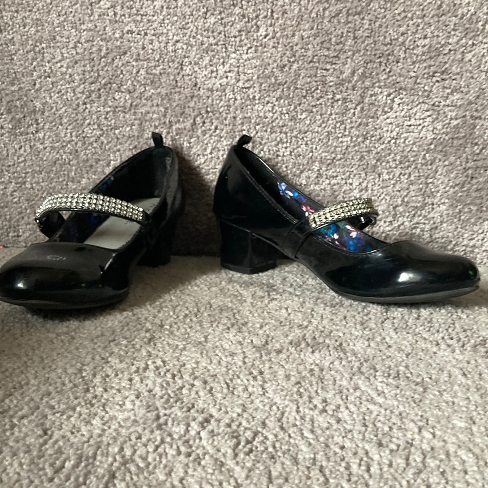 Black girls patent leather dress shoes with heel.